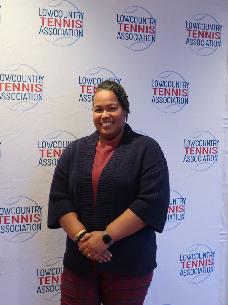An image of Shirley Godfrey-Jackson in front of the LCTA step and repeat/